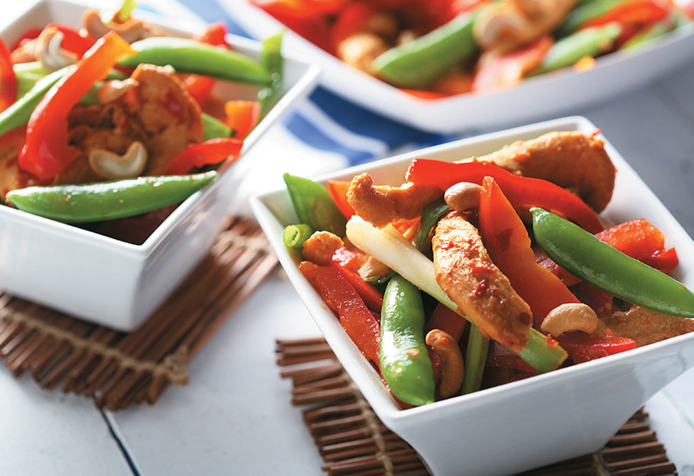 chicken and veggies in a white bowl