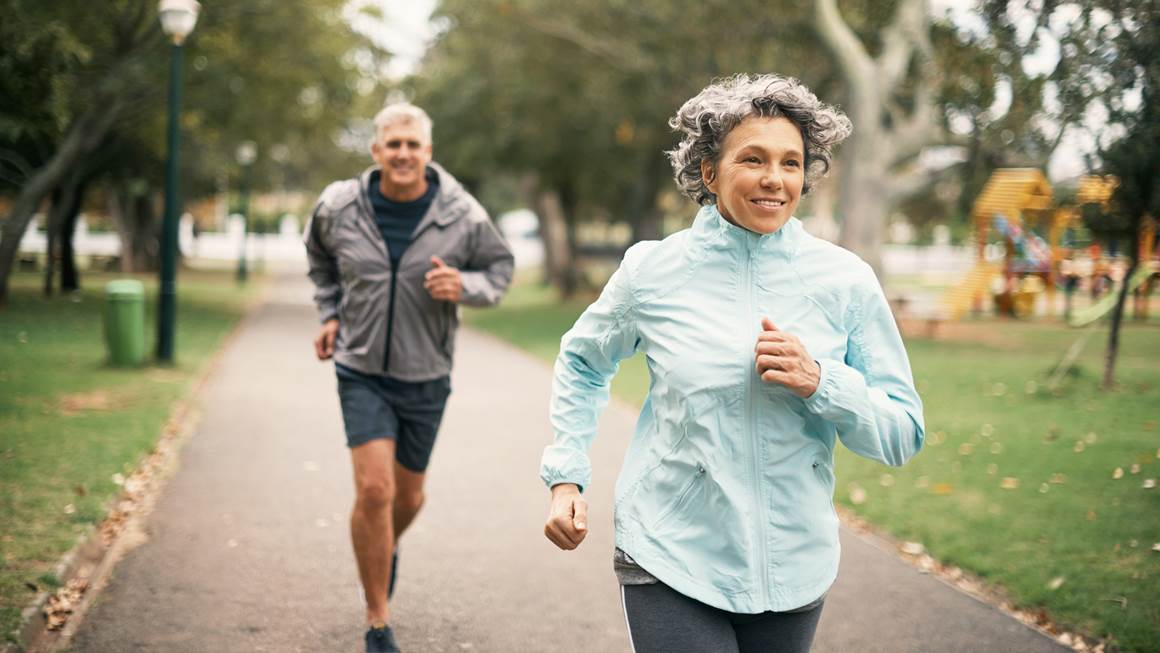 Older couple running together