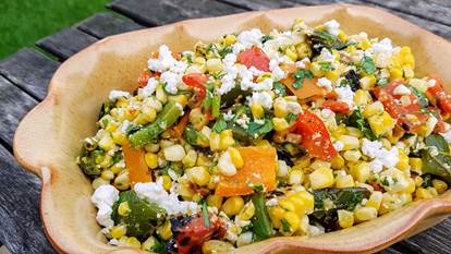 Grilled corn and pepper salad in bowl