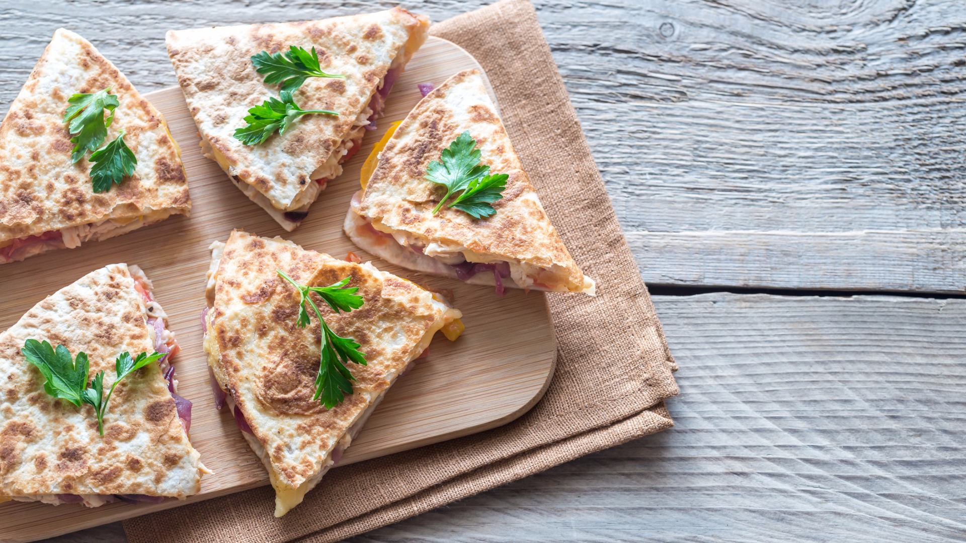 quesadillas on a wooden board