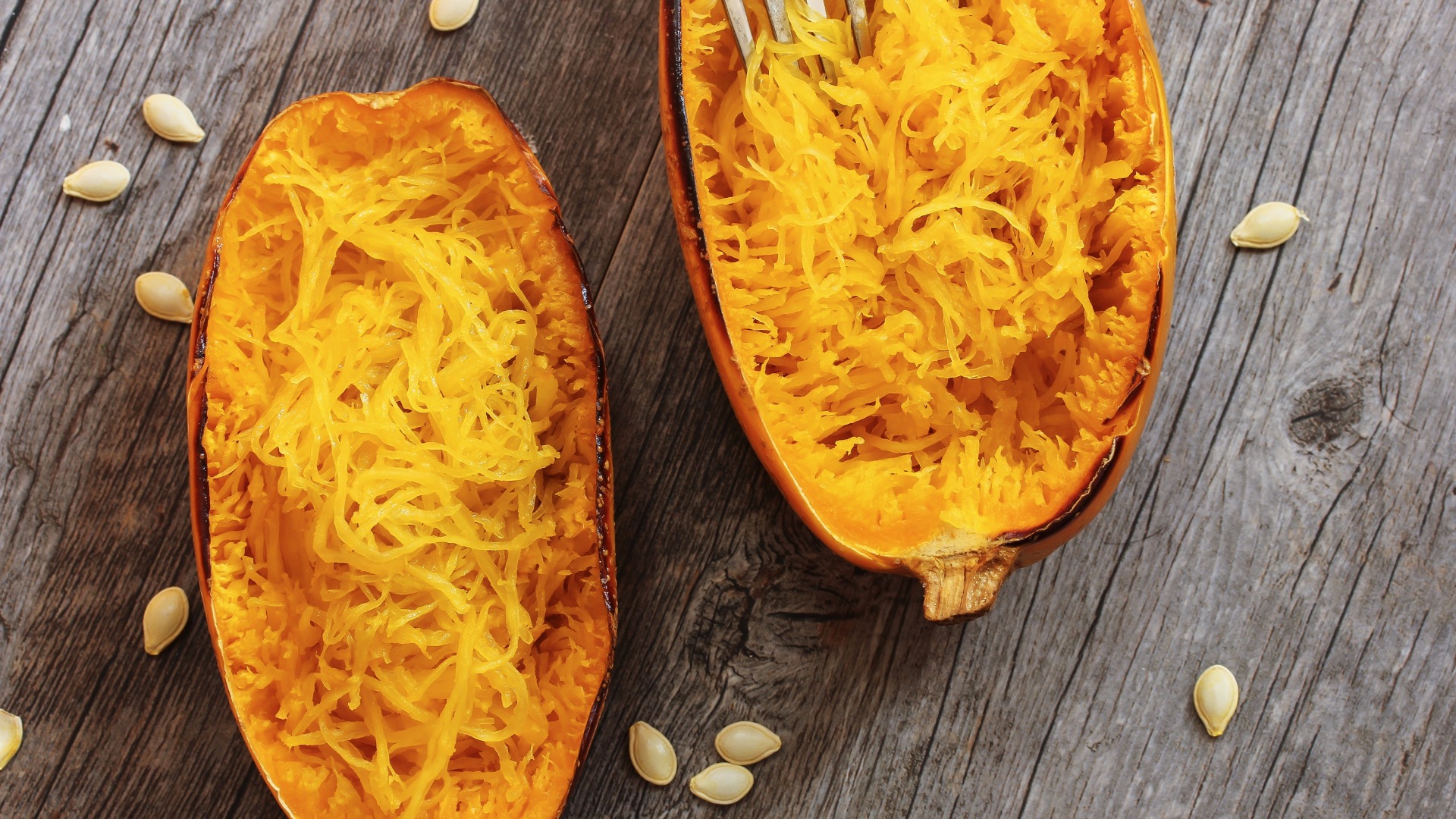 spaghetti squash on a wood table